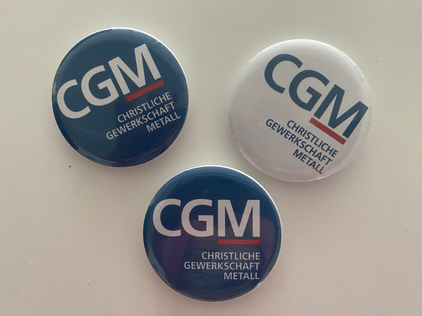 CGM-Logo Button groß und klein