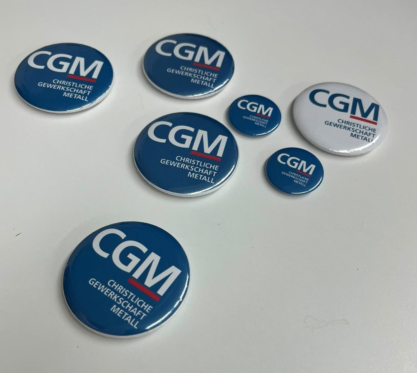 CGM-Logo Button groß und klein